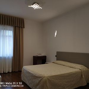 Kamer met een Queen Size Bed